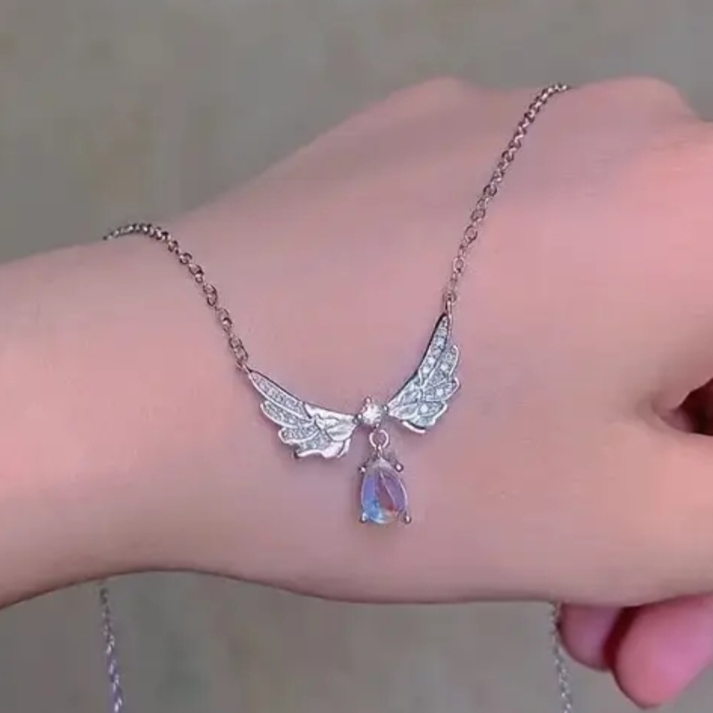 Elegant Silver Wing Necklace with Crystal Pendant